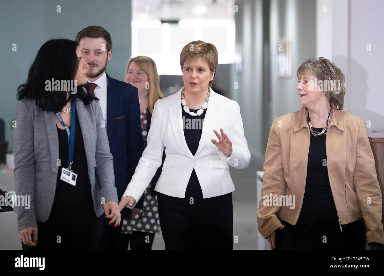First Minister Nicola Sturgeon (centre) during a visit to Tay House, Glasgow, where she met with EU nationals working at the University of Glasgow ahead of next week's European election. Stock Photo