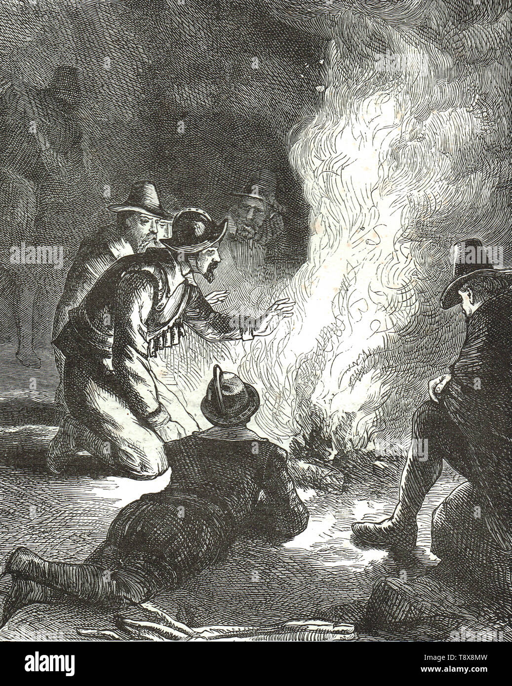 Pilgrim fathers around a watchfire, 1620 Stock Photo
