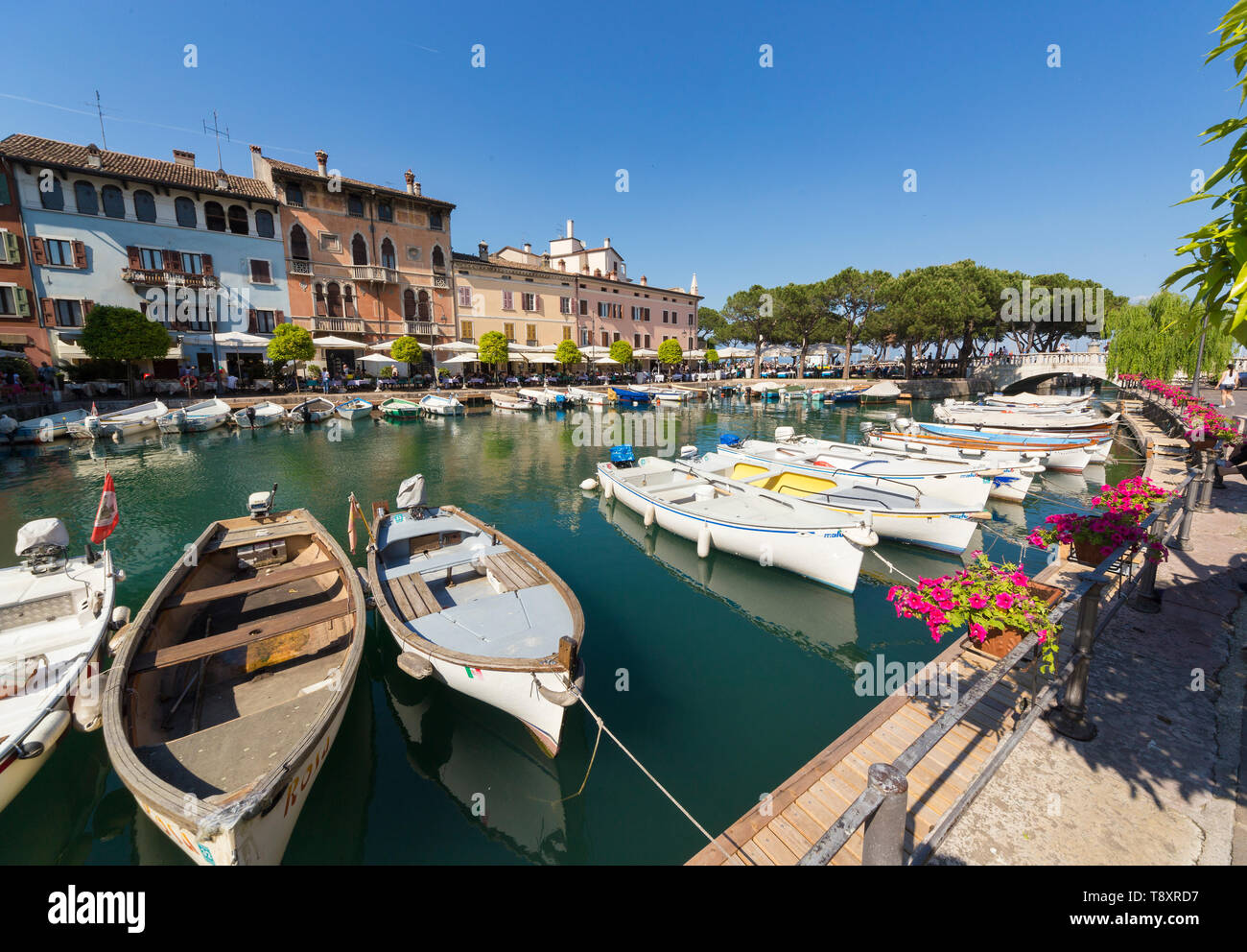 Desenzano del Garda on Lake Garda - quay and harbour with boats Stock Photo  - Alamy