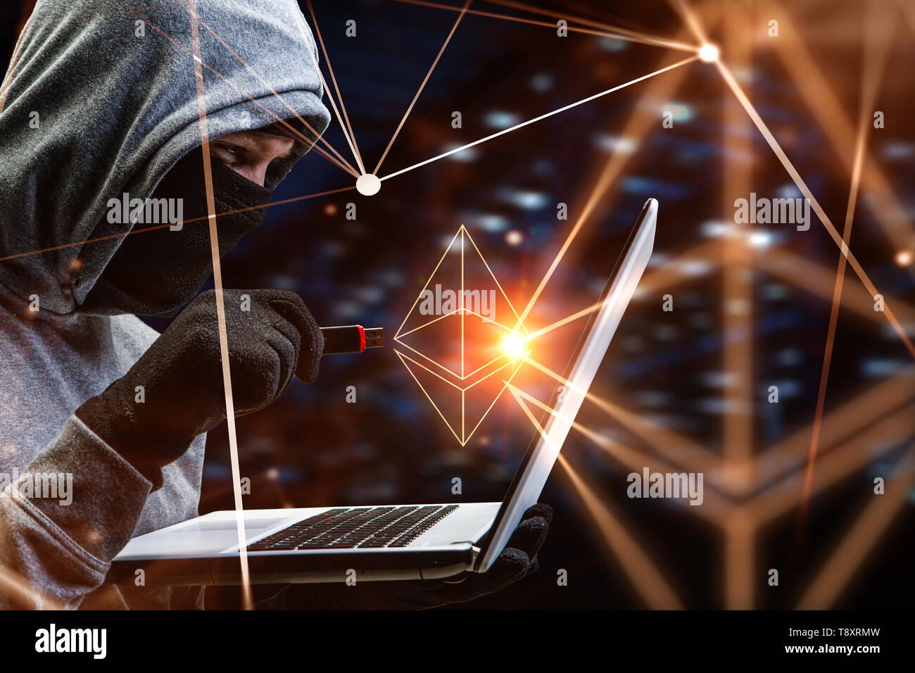 Hacker hunting for crypto currency Stock Photo - Alamy
