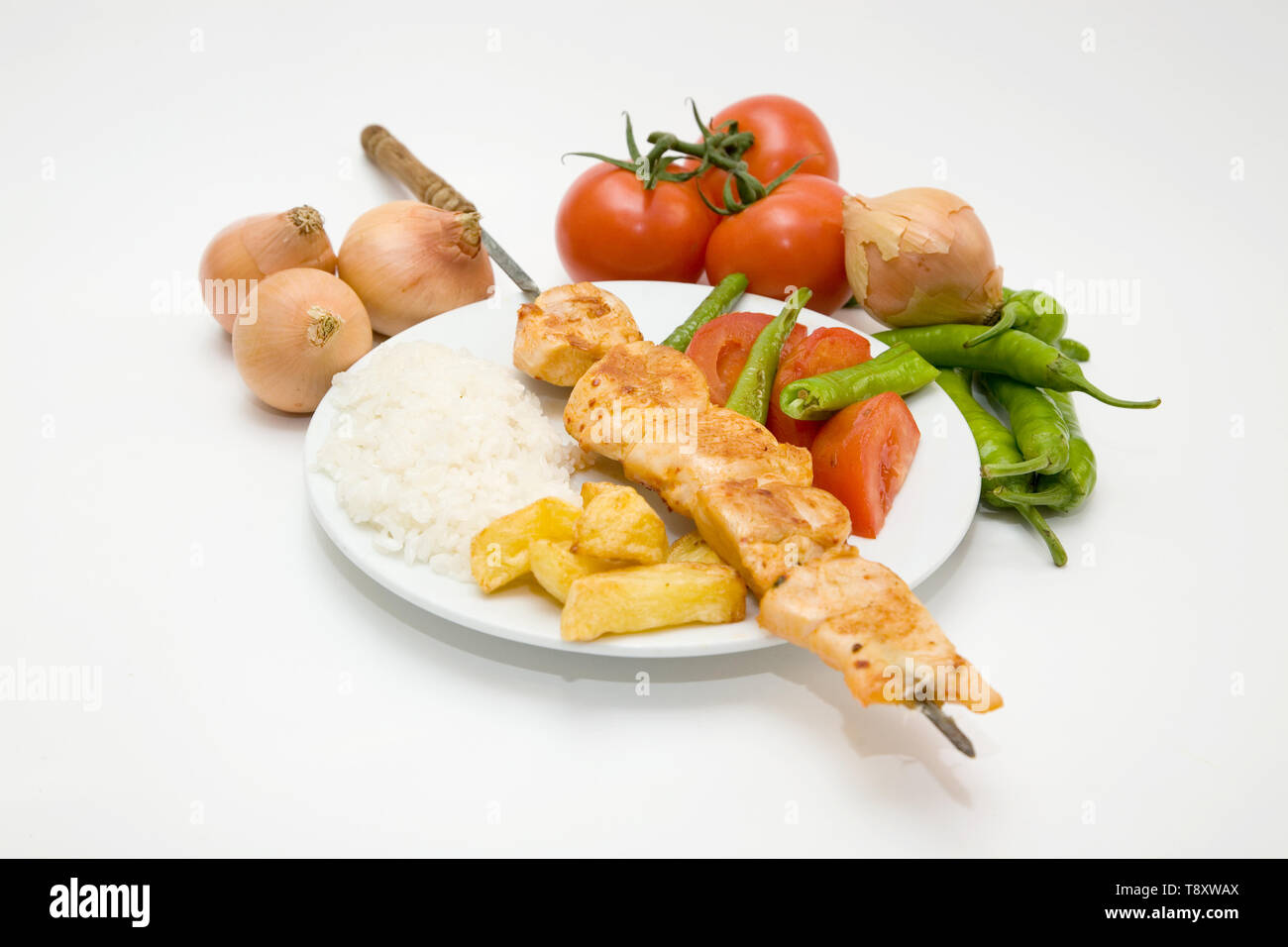 turkish style chicken fillet kebab with rice and salads Stock Photo Alamy