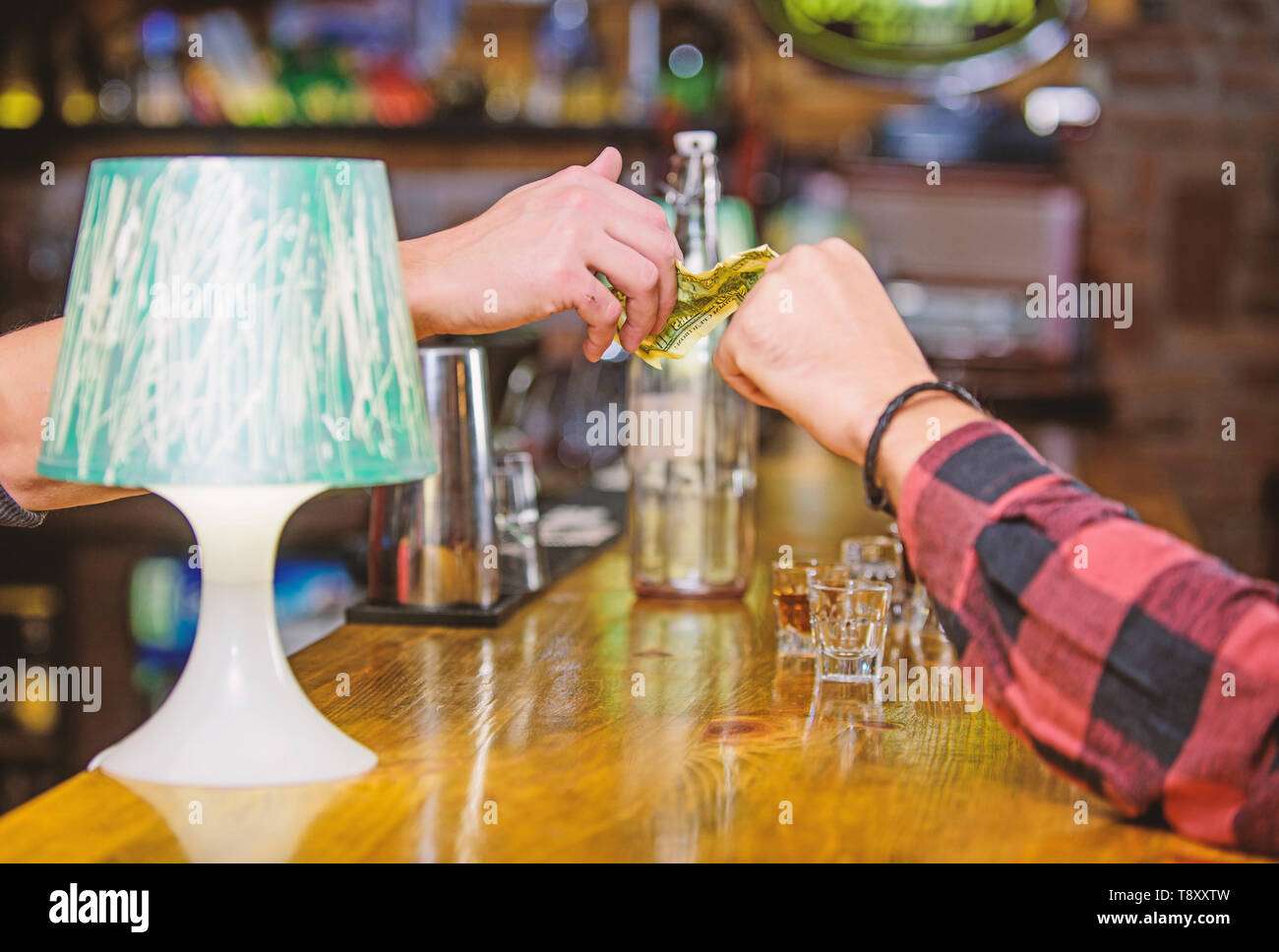 Cash payment. Ordering drinks in bar. Purchase and payment. Cash money