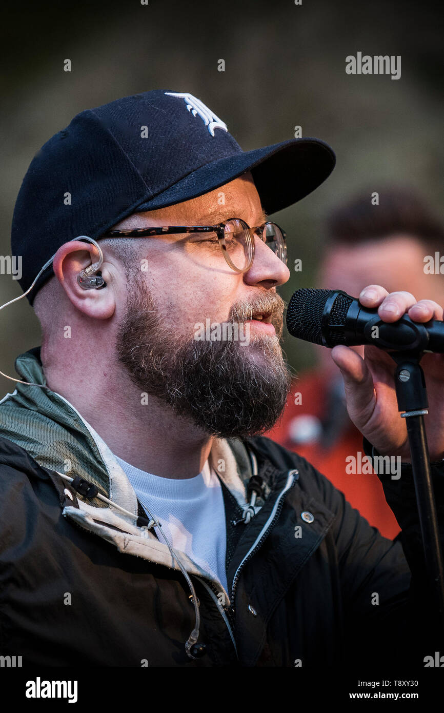 John Turrell, lead vocalist of the band Smoove & Turrell, a group from North East of England performing their Northern Funk at Trebah Garden in Cornwa Stock Photo