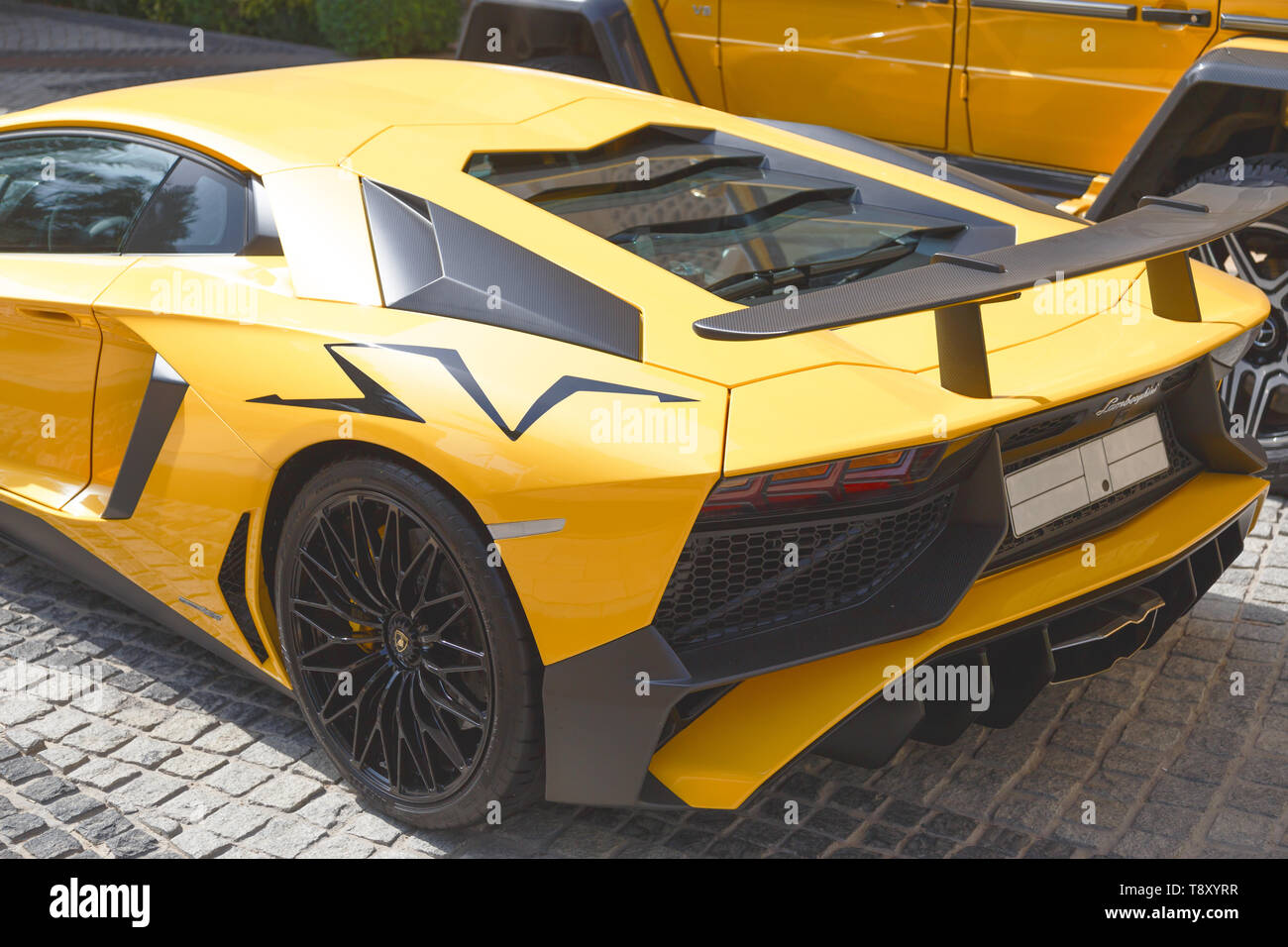 DUBAI, UAE - JANUARY 08, 2019: yellow luxury supercar Lamborghini Aventador Roadster in Dubai Stock Photo