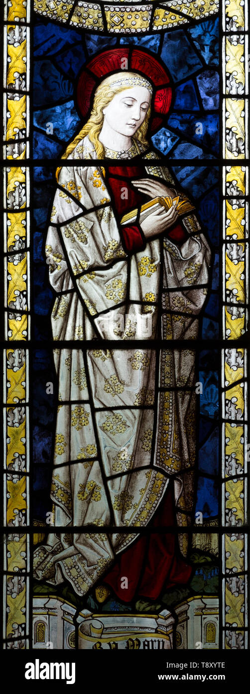 Blessed Virgin Mary stained glass window by Burlisson and Grylls 1906, All Saints church, Stanton St Bernard, Wiltshire, England, UK Stock Photo