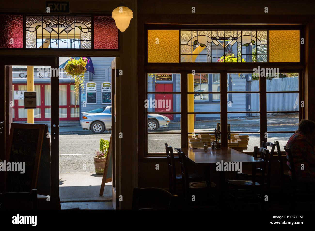 Interior of a cafe looking out onto street, Reefton, South Island, New