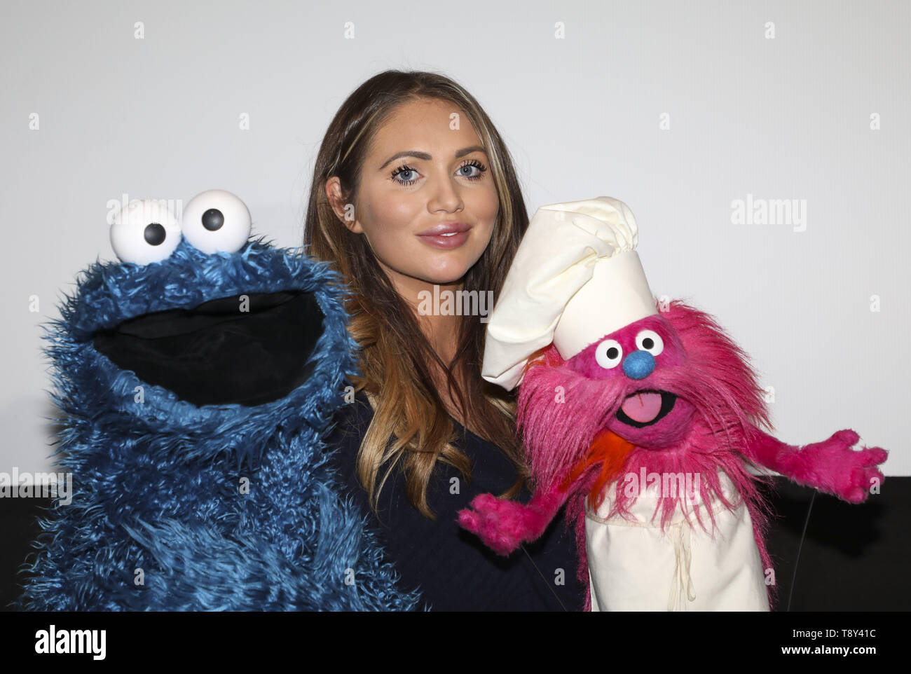 TV personality Amy Childs and her daughter Polly attend 'Cookie Monster’s Foodie Truck' Tiny Pop TV show  Featuring: Amy Childs, Cookie Monster, Gonger Where: London, United Kingdom When: 14 Apr 2019 Credit: Jed Leicester/PinPep/WENN.com Stock Photo
