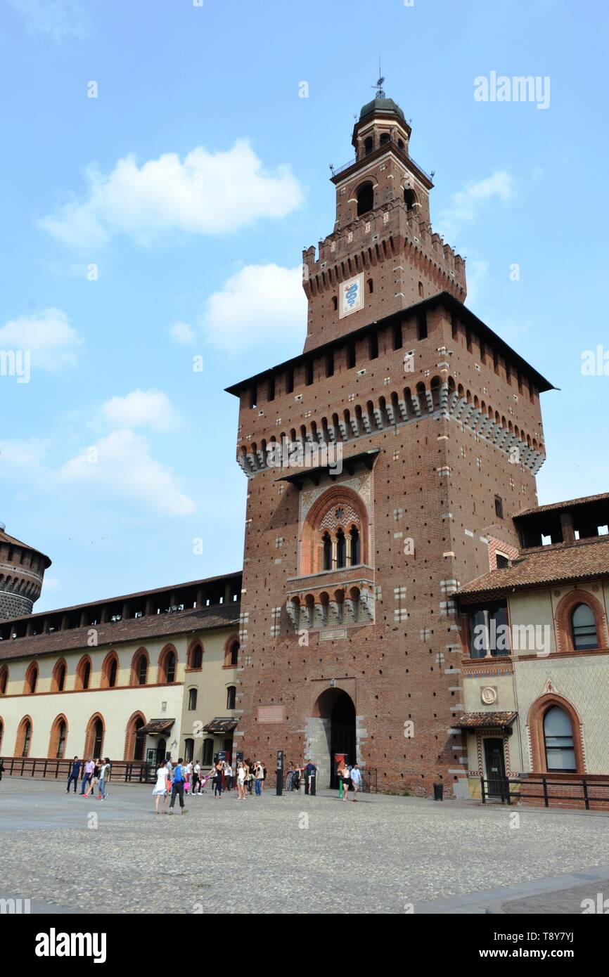 Milan/Italy - June 1, 2015: View from courtyard to ancient central entrance medieval tower of Sforza castle. Stock Photo