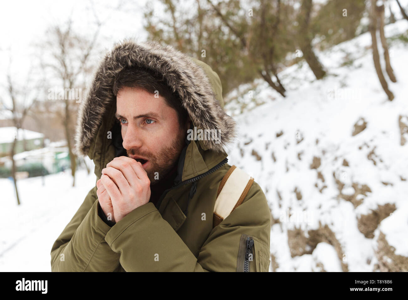 Young man wearing winter jacket hi-res stock photography and images - Alamy