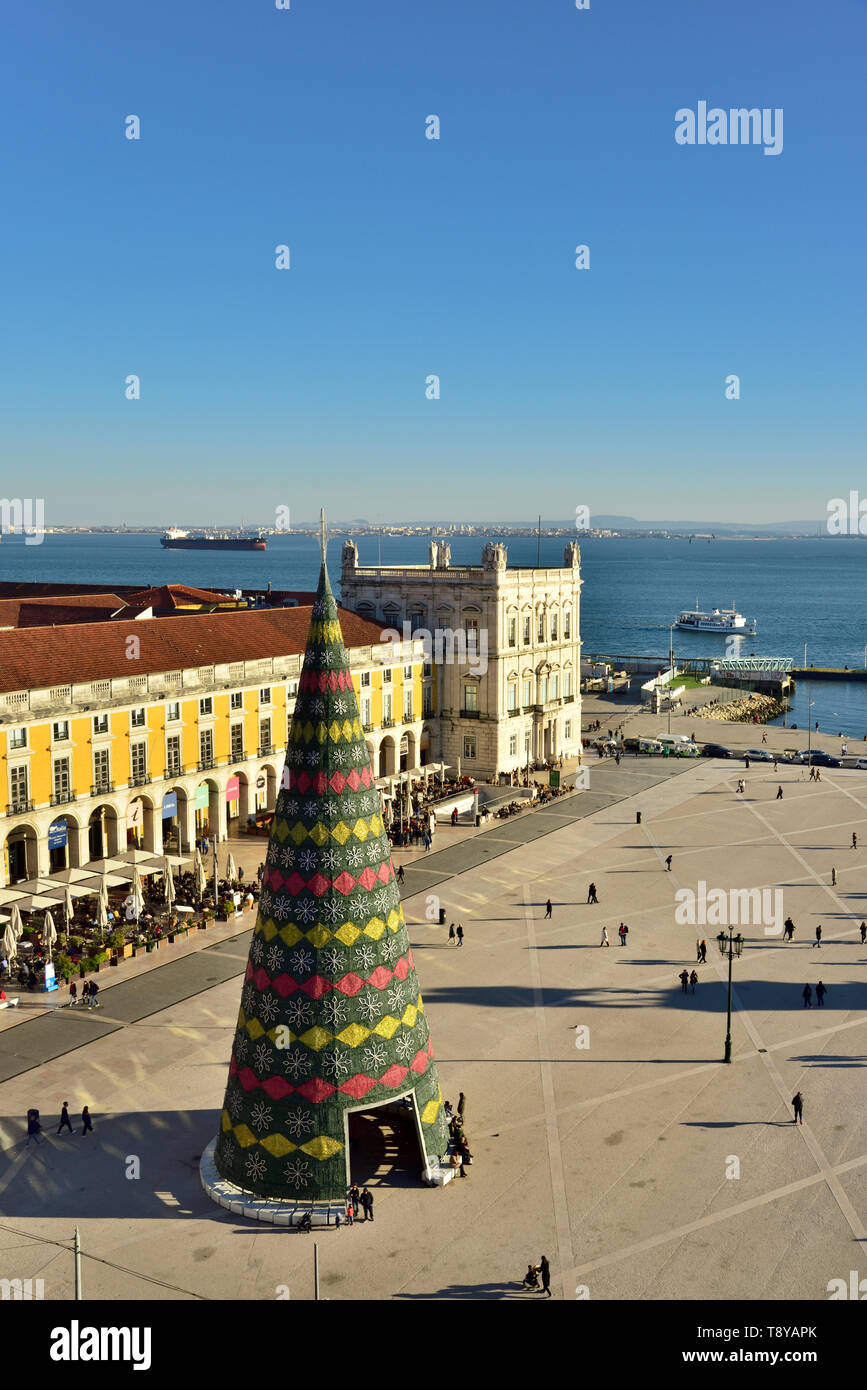 Terreiro do Paço (Praça do Comércio) in the evening with the traditional Christmas Tree, one of the centers of the historic city facing the Tagus rive Stock Photo