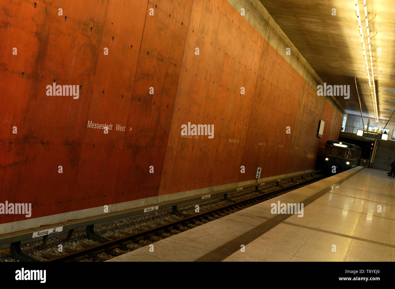 Subway arriving at subway station Messestadt West in Munich, Germany Stock Photo