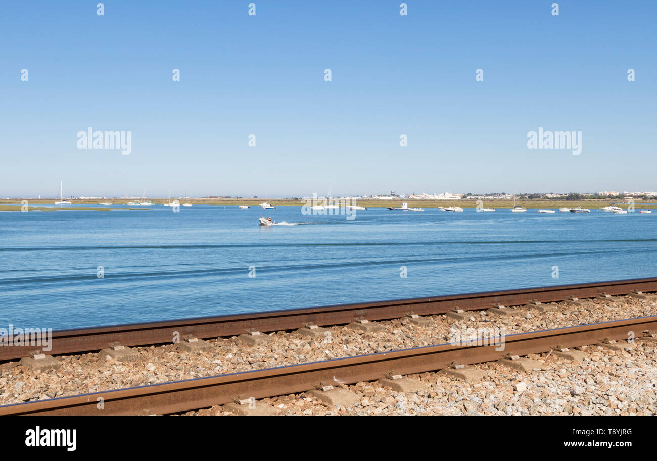 railway on the sea at Faro Portugal Stock Photo