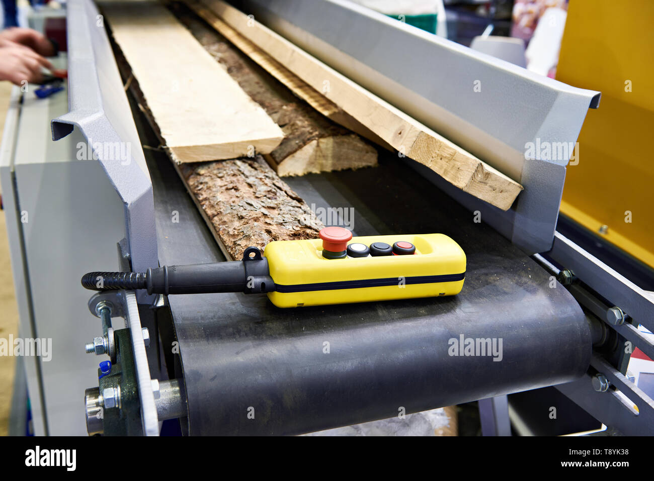 Remote control on a conveyor with boards in a wooden factory Stock Photo Alamy