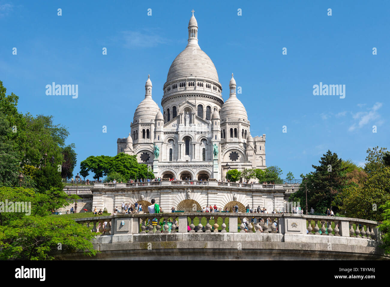 View of Sacre-Coeur Basilica from entrance to Square Louise-Michel in Montmartre, Paris, France Stock Photo