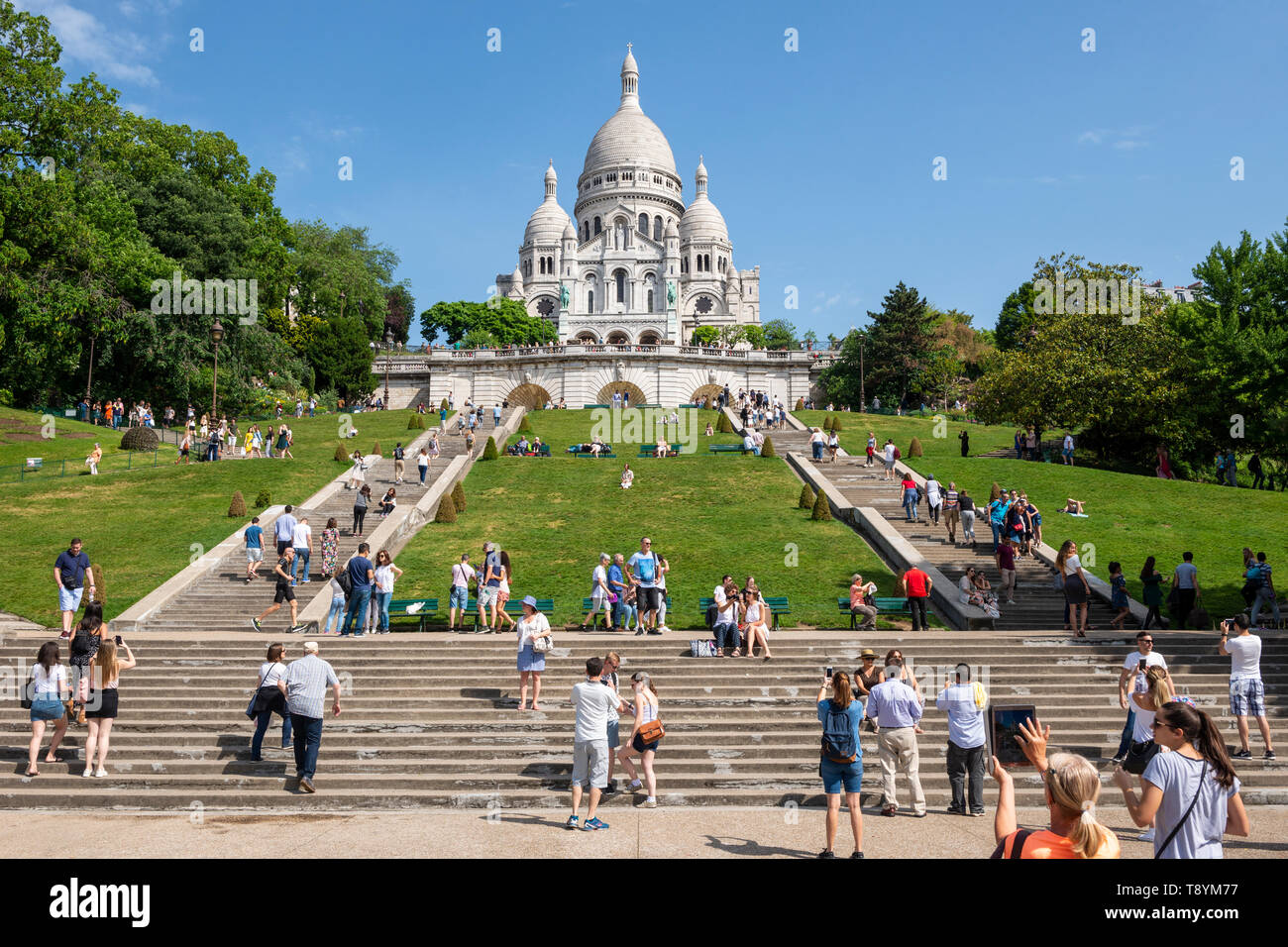 View of Sacre-Coeur Basilica and Square Louise-Michel in Montmartre, Paris, France Stock Photo
