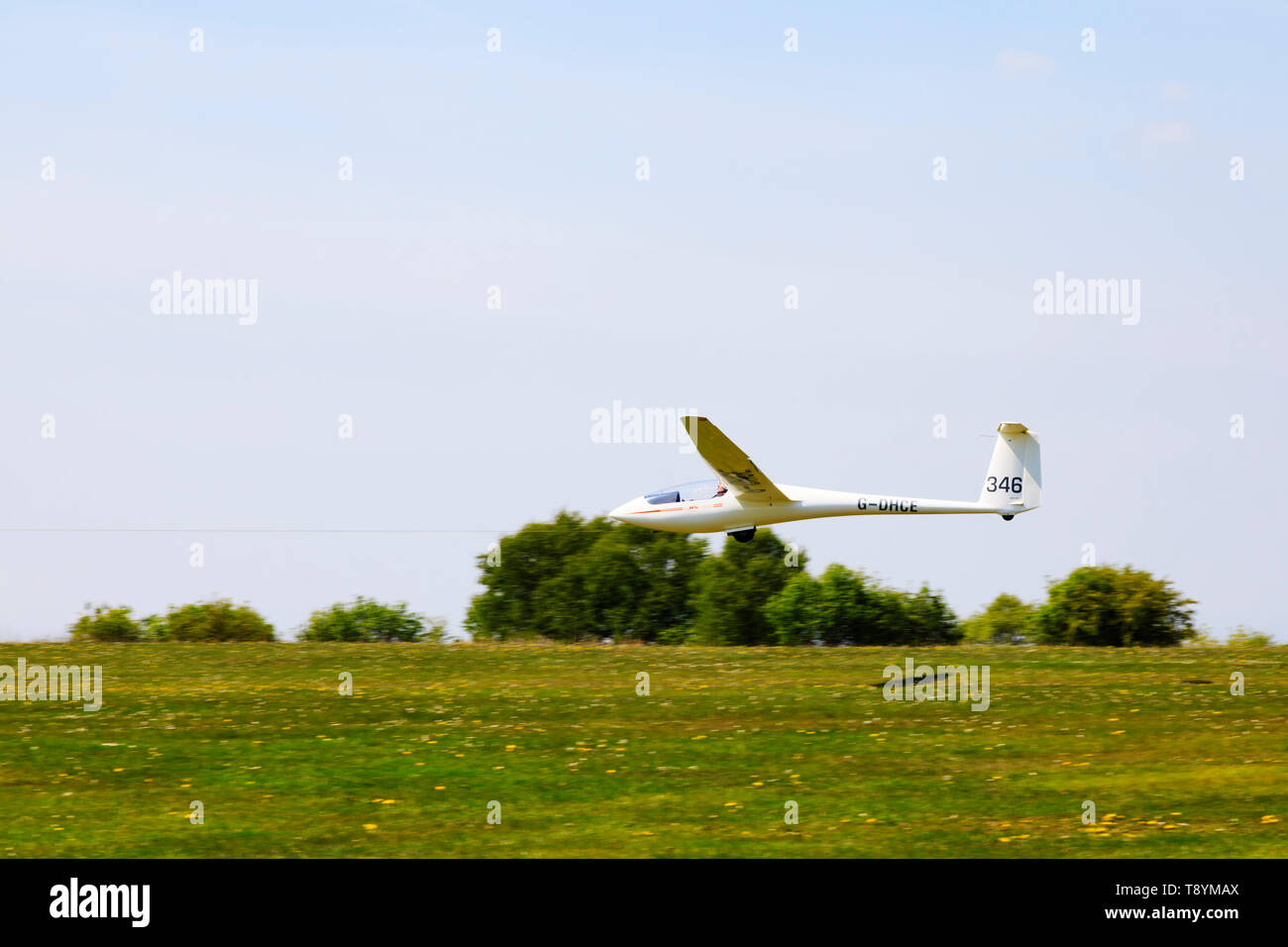 Alexander Schleicher ASW19b glider launching on aerotow, Yorkshire Gliding Club airfield at Sutton Bank in the North Yorkshire Moors National Park. Stock Photo