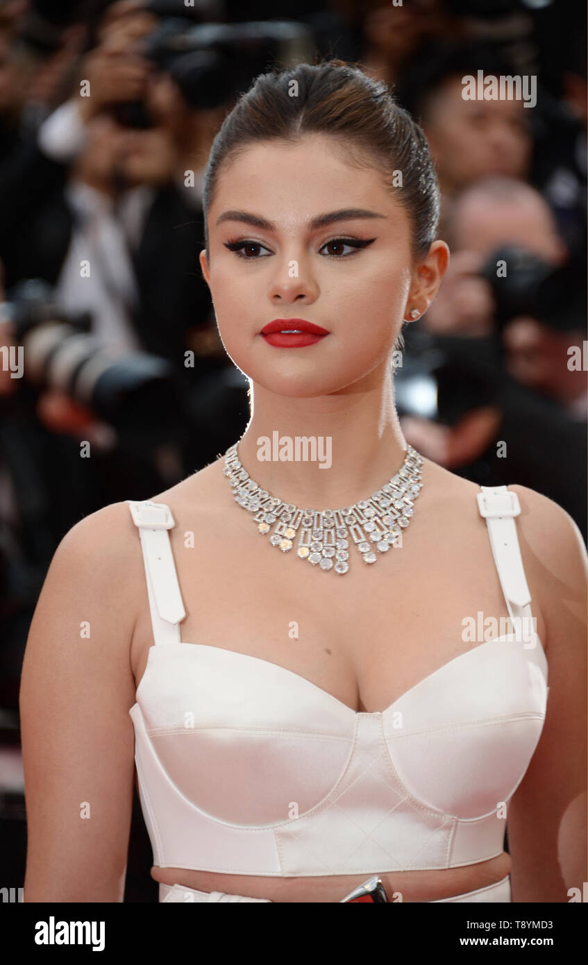 Selena Gomez Louis Vuitton dress, Bulgari necklace and ring attends the  opening ceremony and screening of The Dead Don't Die during the 72nd  annual Cannes Film Festival on May 14, 2019 in
