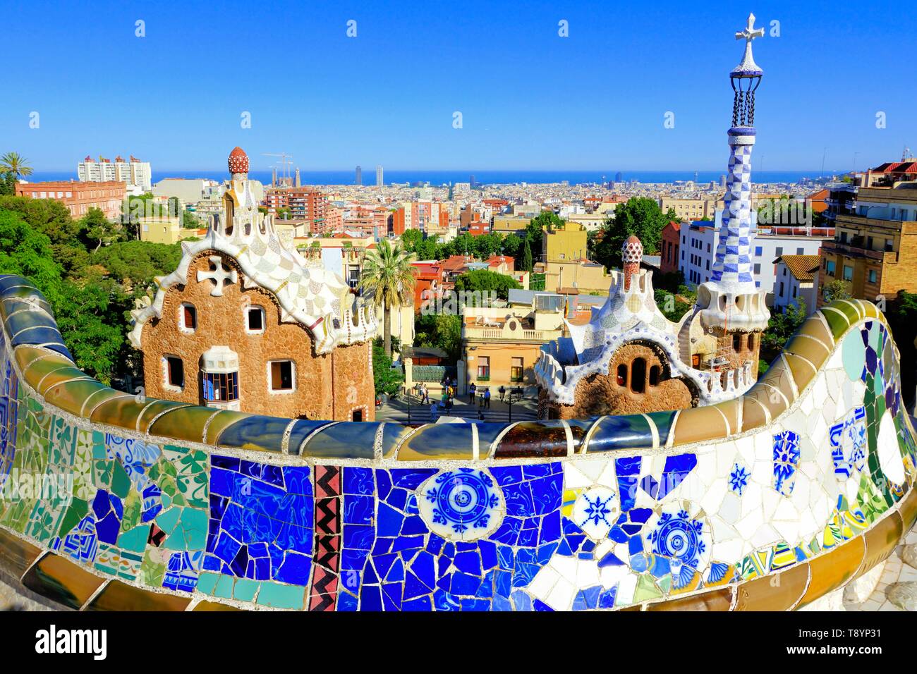 View over the beautiful Park Guell with colorful mosaic wall, Barcelona, Spain Stock Photo