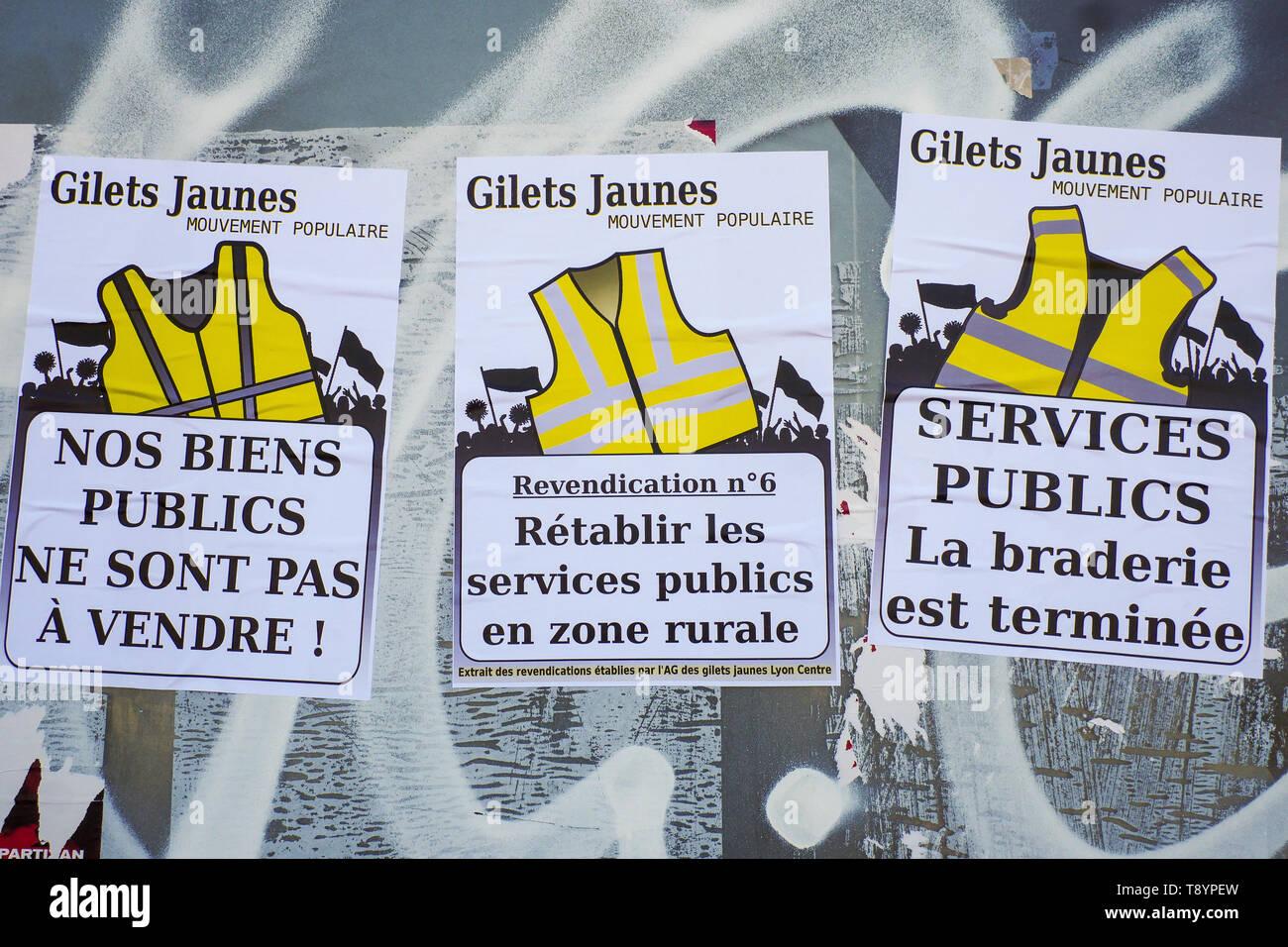 Political posters, Yellow Jackets movement, Lyon, France Stock Photo