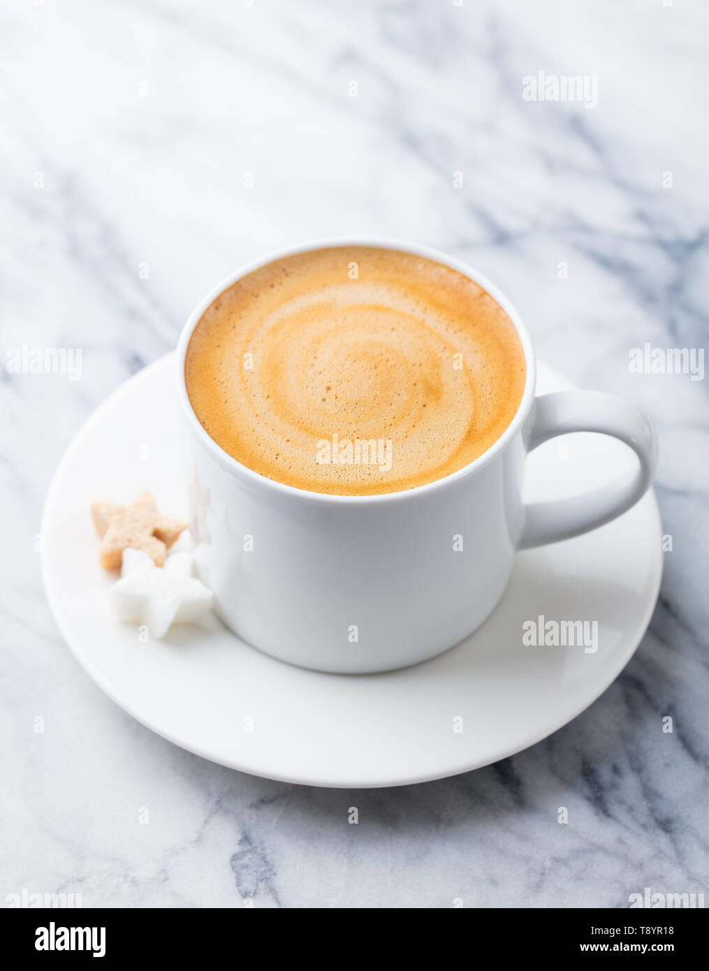 Coffee, espresso in white cup of marble table background. Stock Photo