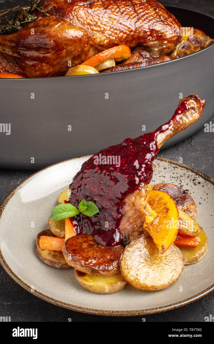 Roasted Duck Leg with Forest Fruit Sauce Stock Photo