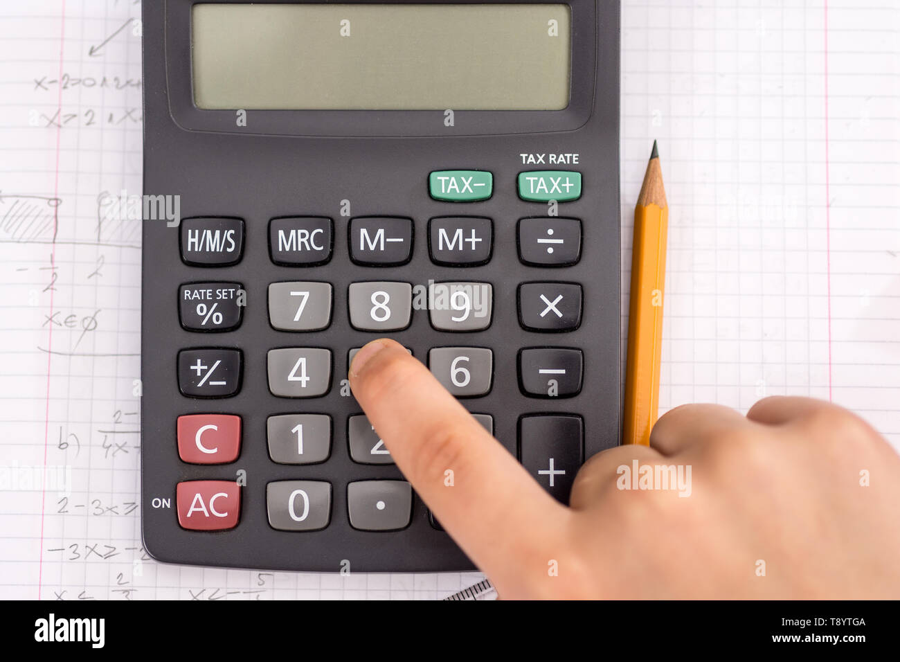 Finger On The Calculator Button During Mathematical Lesson School Concept Stock Photo Alamy Finger On The Calculator Button During Mathematical Lesson School Concept Stock Photo Alamy
