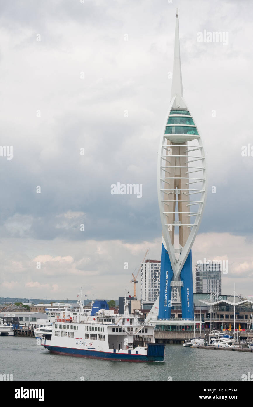 A Wightlink ferry approaches Portsmouth harbour with the Spinnaker Tower in the background Stock Photo