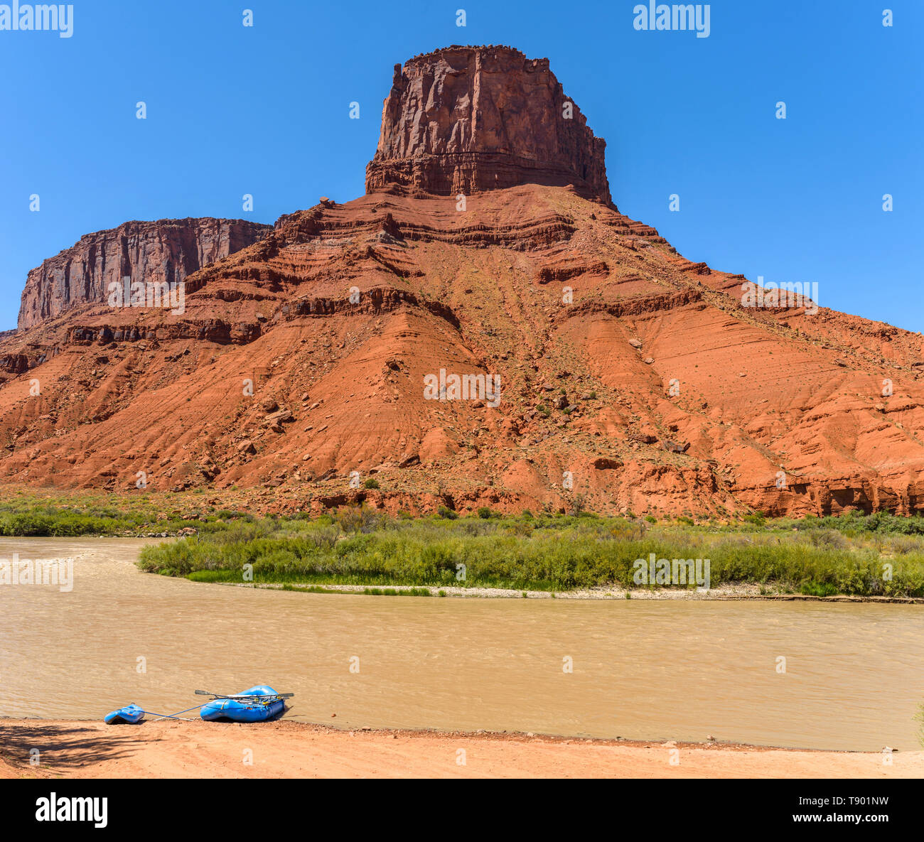 Colorado River in Red Castle Valley - Colorado River running at base of a big red sandstone butte in Castle Valley at Utah and Colorado border, USA. Stock Photo