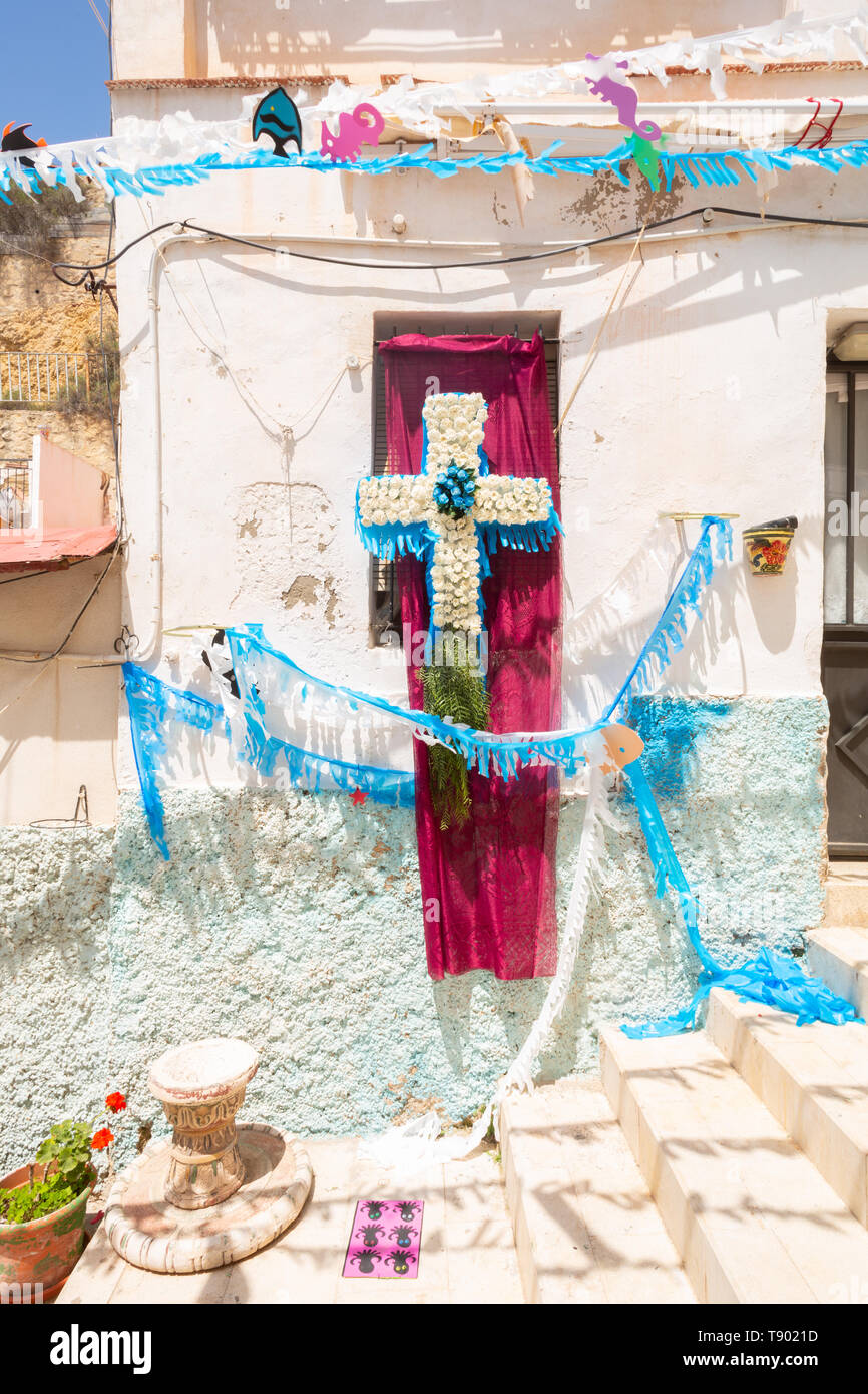 Celebrating May Day crosses in a disctrict Santa cruz, Alicante, Spain Stock Photo