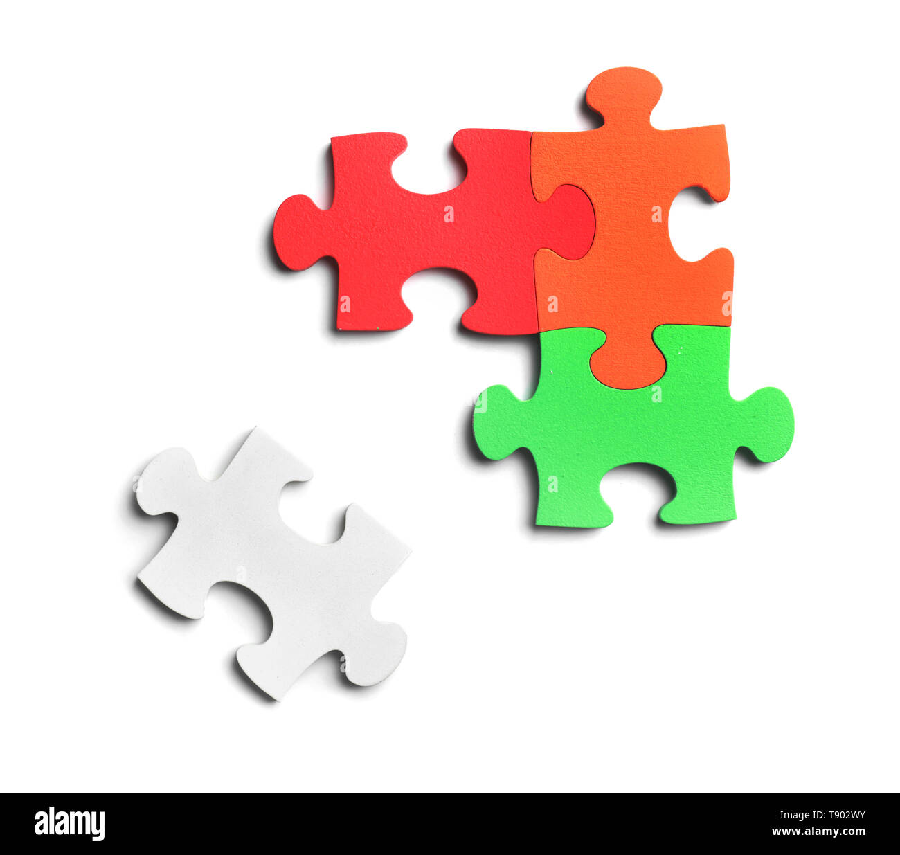 Colorful pieces of puzzle on white background Stock Photo - Alamy