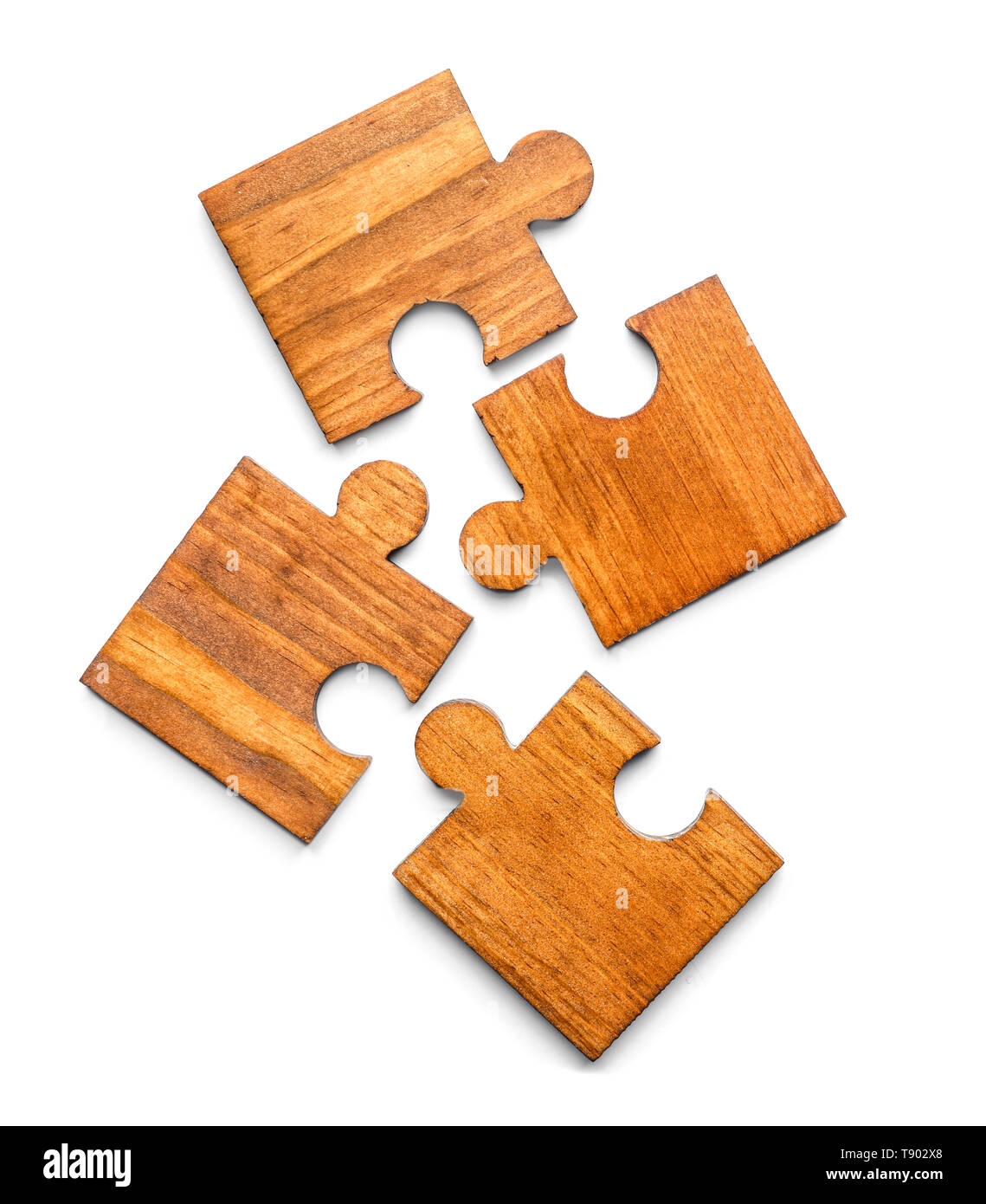 Pieces of wooden puzzle on white background Stock Photo - Alamy