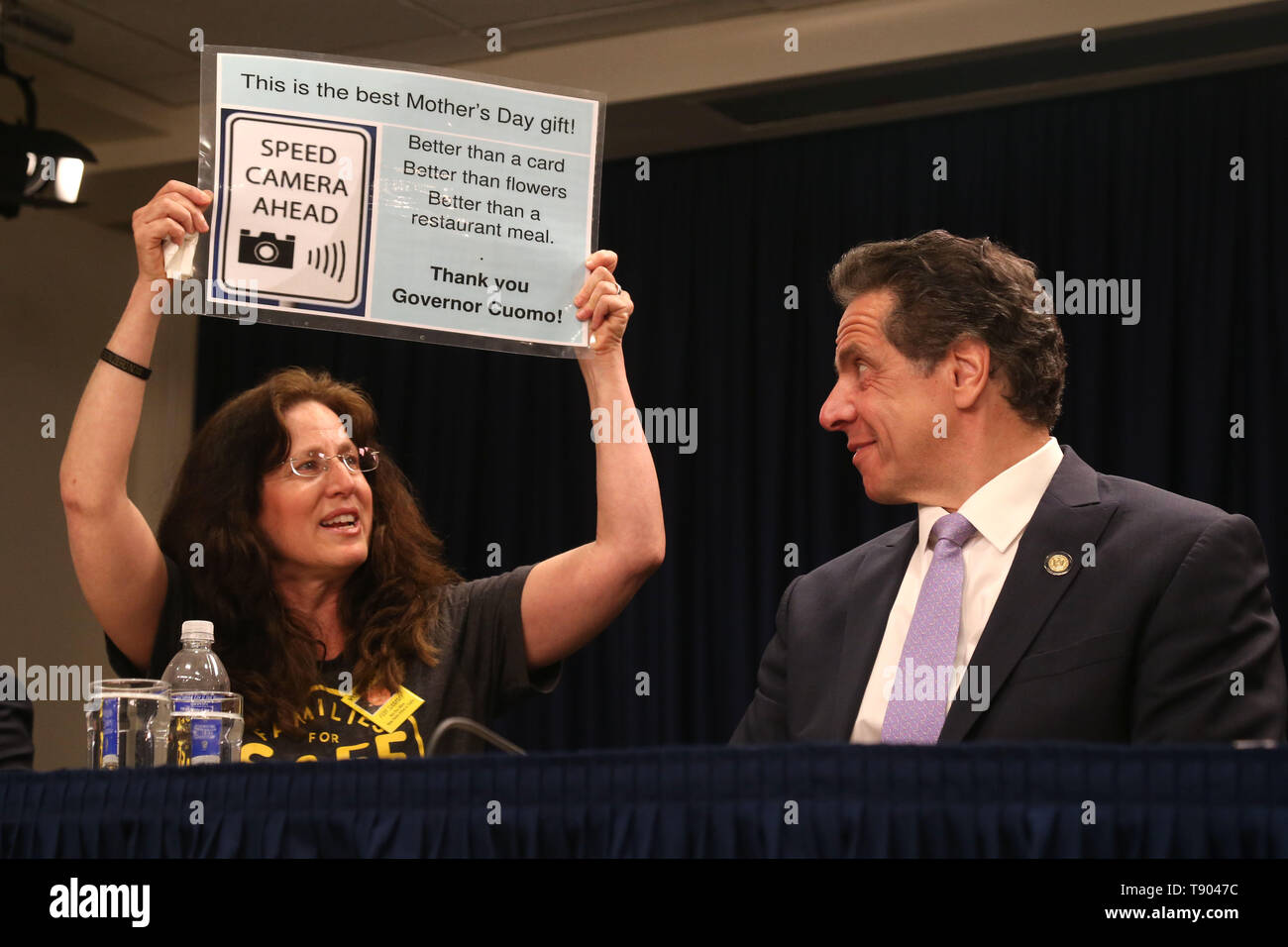 May 12, 2019 - New York, NY, USA - May 12, 2019 -  Governor Andrew M. Cuomo signed legislation at a press conference to set up speed cameras in front of New York schools at  the New York State Offices on 633 3rd Avenue. Families For Safe Streets Founder Amy Cohen, whose son Sammy Cohen Eckstein was struck and killed by a motorist helped make the announcement  (Credit Image: © Dan Herrick/ZUMA Wire) Stock Photo