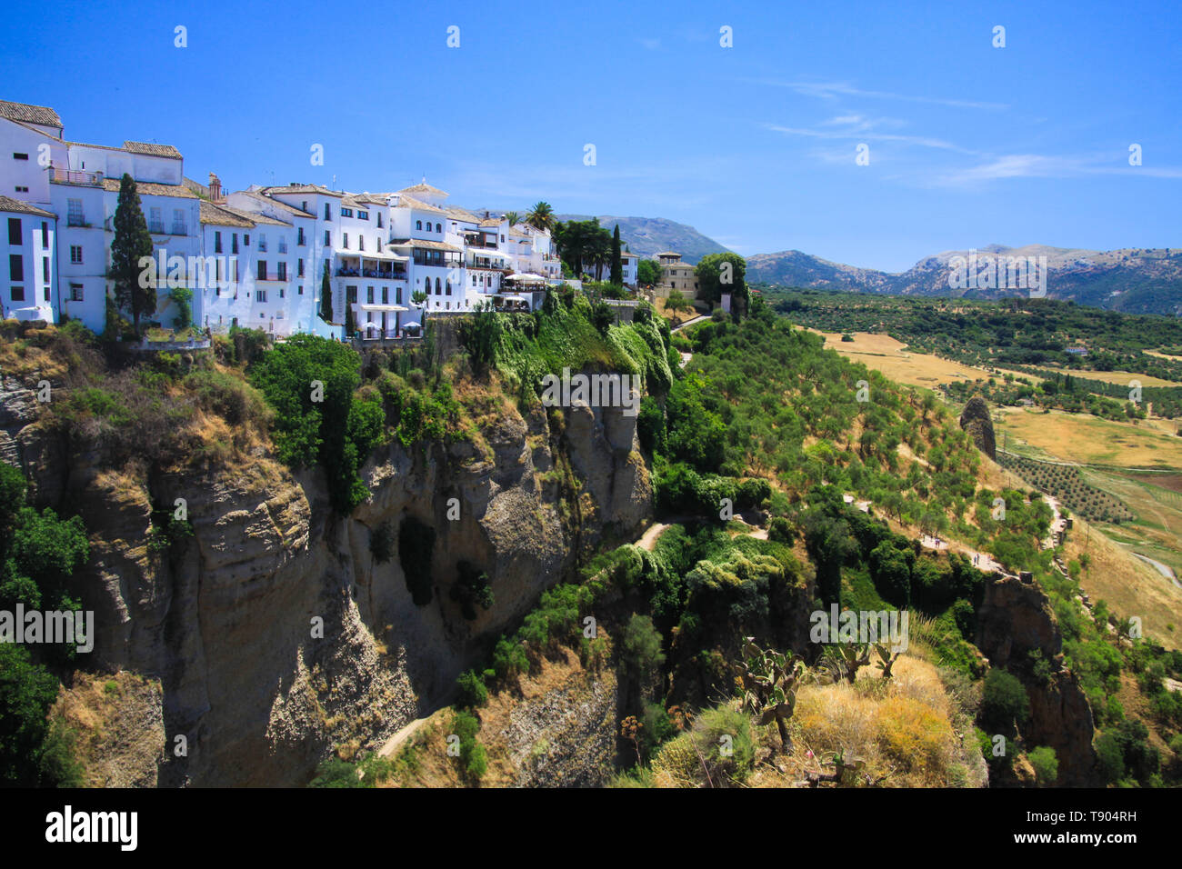 View on ancient village Ronda located on plateau surrounded by rural plains in Andalusia, Spain Stock Photo