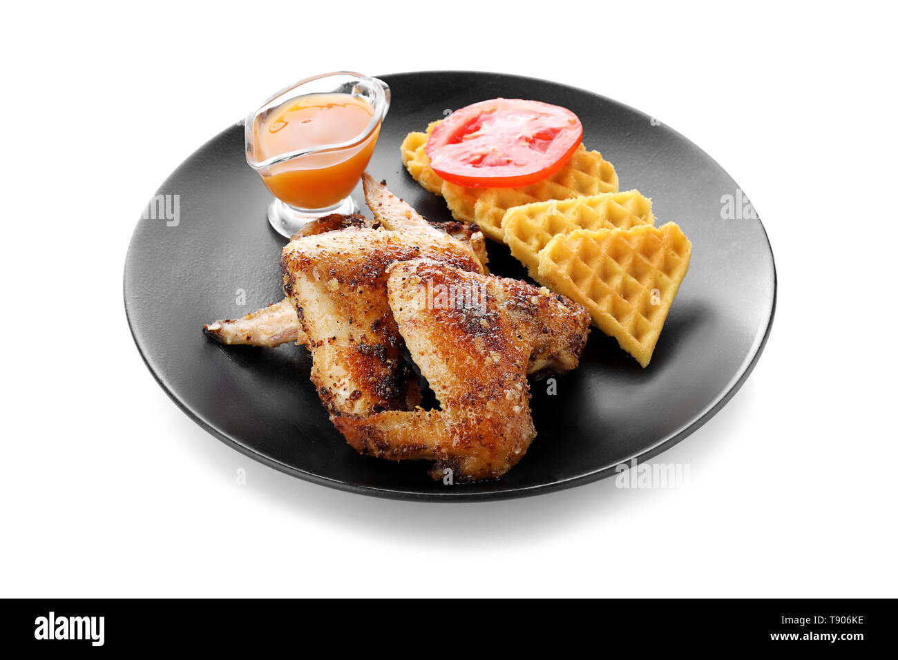 Delicious Waffles With Chicken Wings And Sauce On Plate Isolated On White Stock Photo Alamy