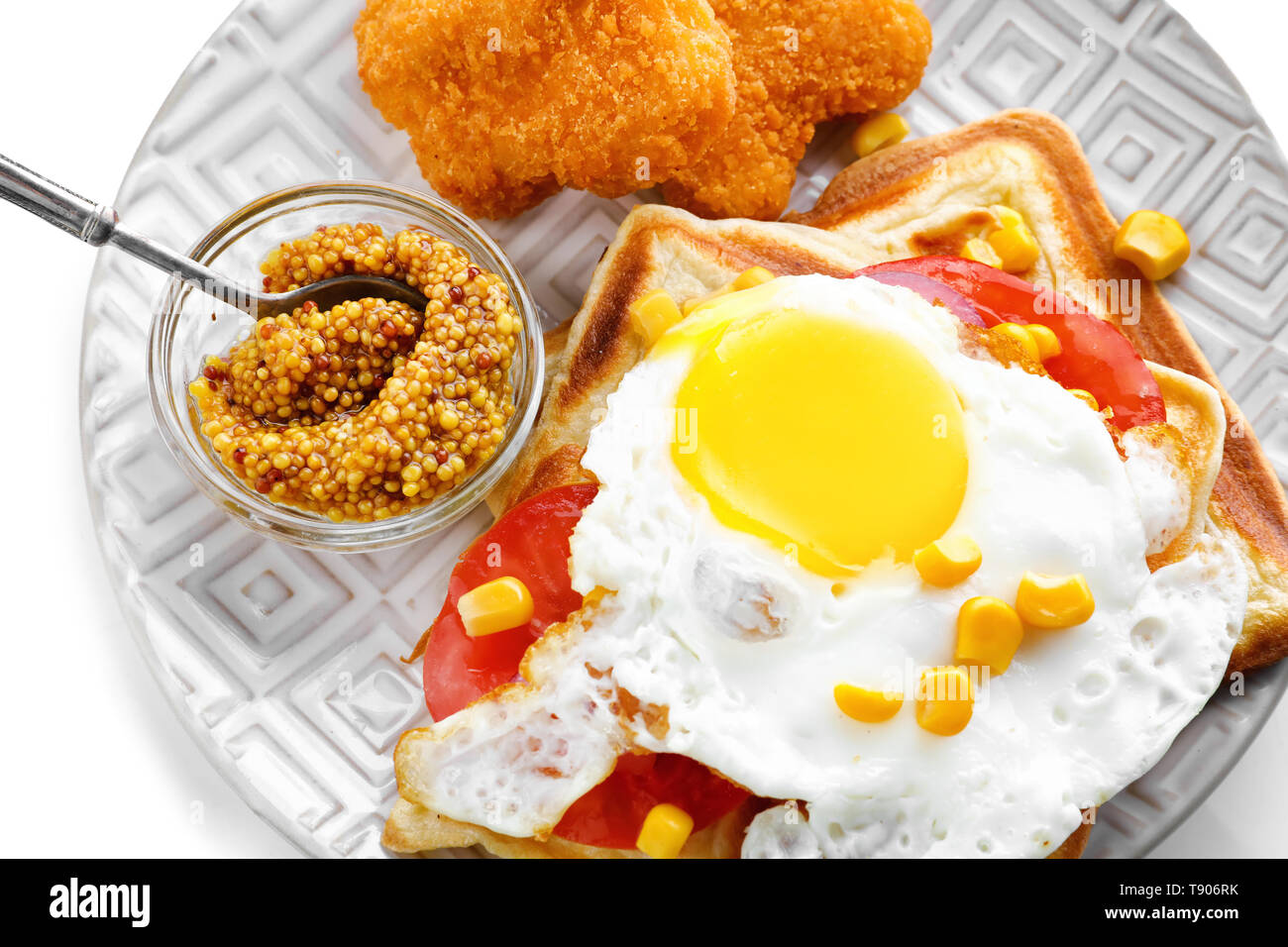 Delicious Waffles With Chicken Nuggets Mustard And Fried Egg On Plate Isolated On White Stock Photo Alamy