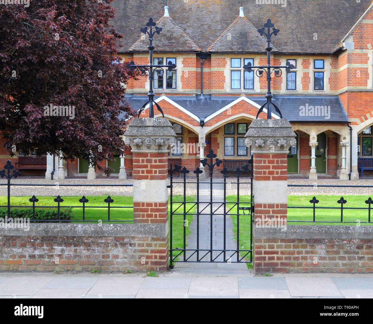 Side gate of Faversham Almshouses, opened 1863, Faversham, Kent, UK. Stock Photo