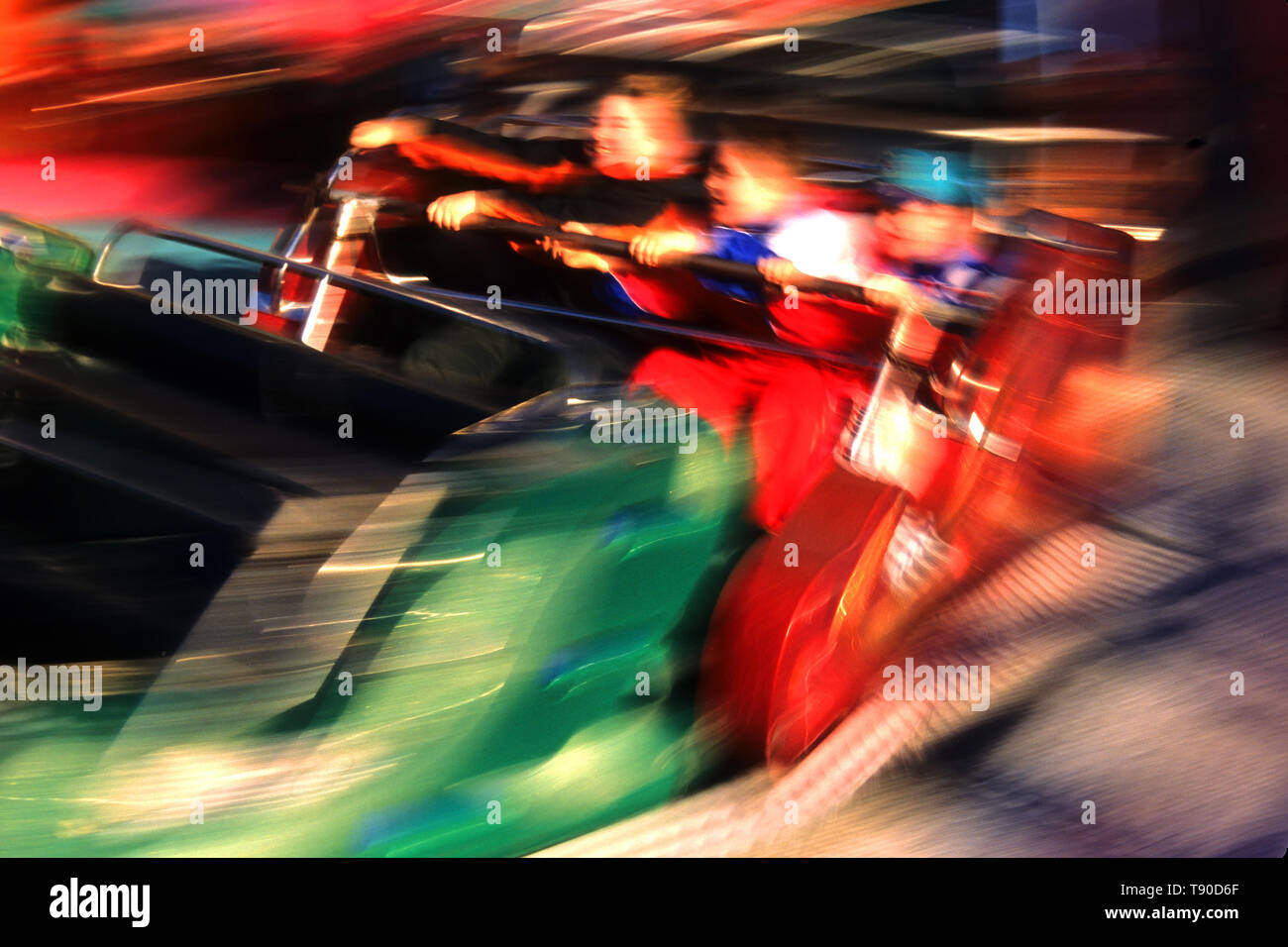 Blurred action of children on a carnival ride at the Fryeburg Fair, Fryeberg, Maine, USA Stock Photo