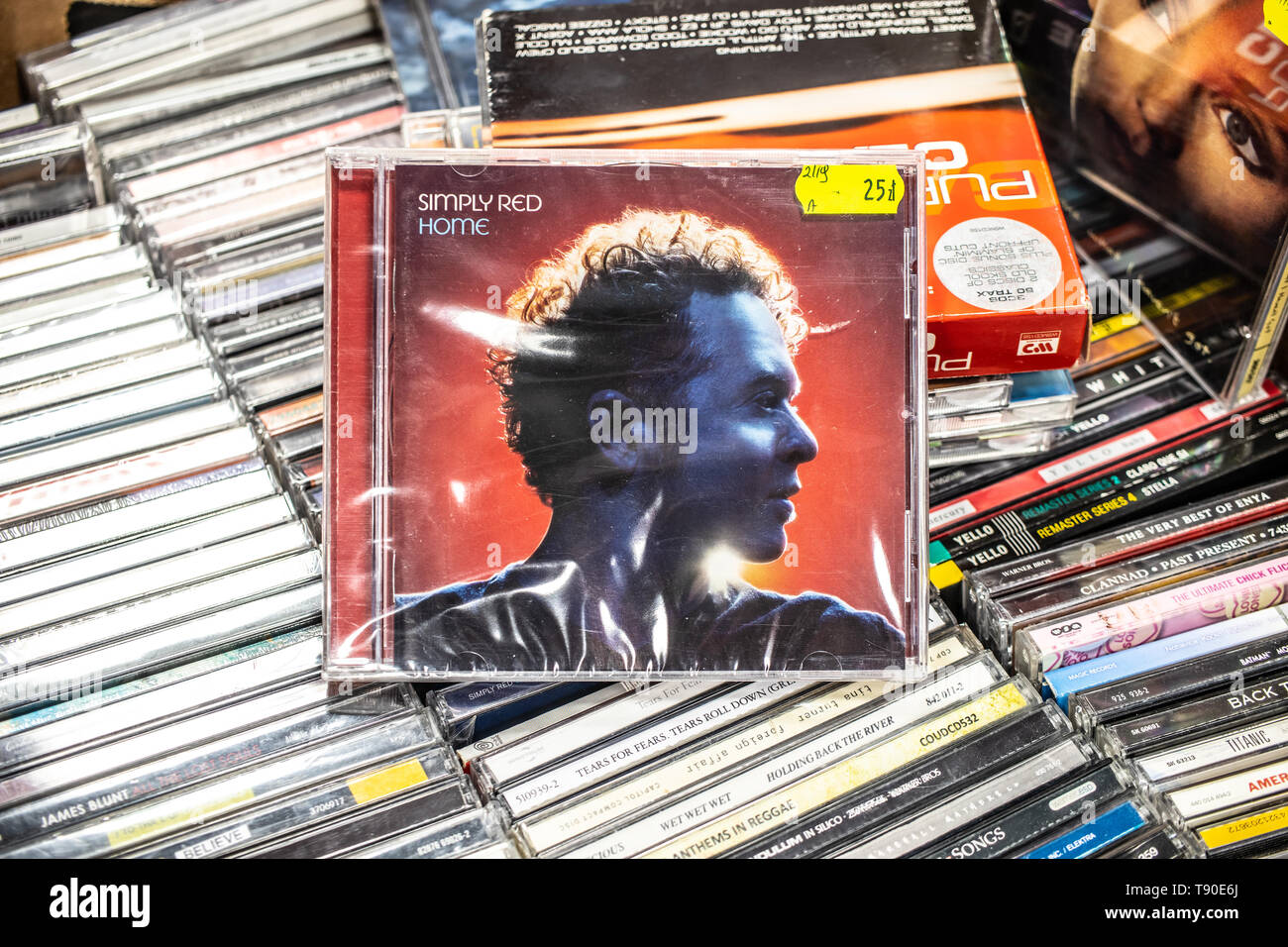 Nadarzyn, Poland, May 11, 2019: Simply Red HOME CD album on display for sale, famous British soul and pop band, lead singer Mick Hucknall, collection Stock Photo