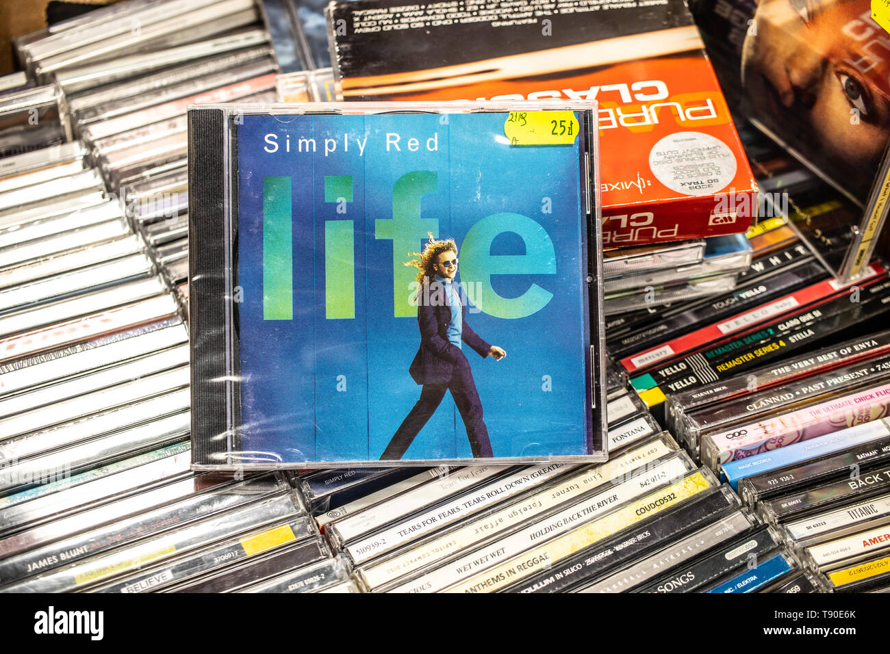 Nadarzyn, Poland, May 11, 2019: Simply Red LIFE CD album on display for sale, famous British soul and pop band, lead singer Mick Hucknall, collection Stock Photo