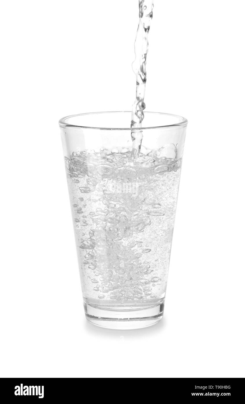 Pouring of mineral water in glass on white background Stock Photo Alamy
