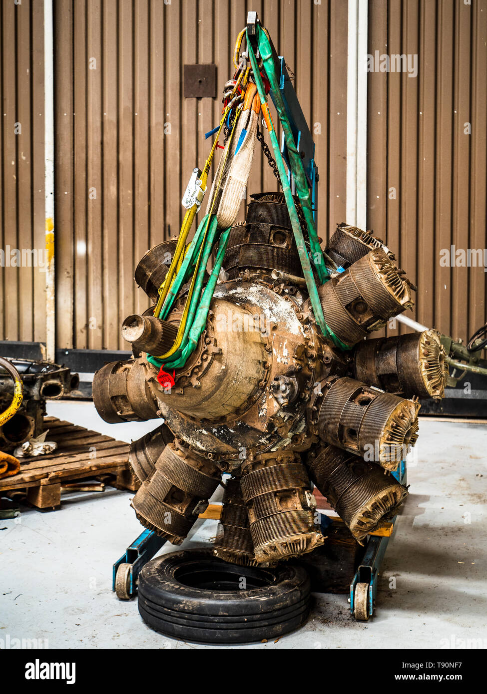 Vintage radial aircraft engine awaiting restoration at the Imperial War Museum Duxford UK Stock Photo