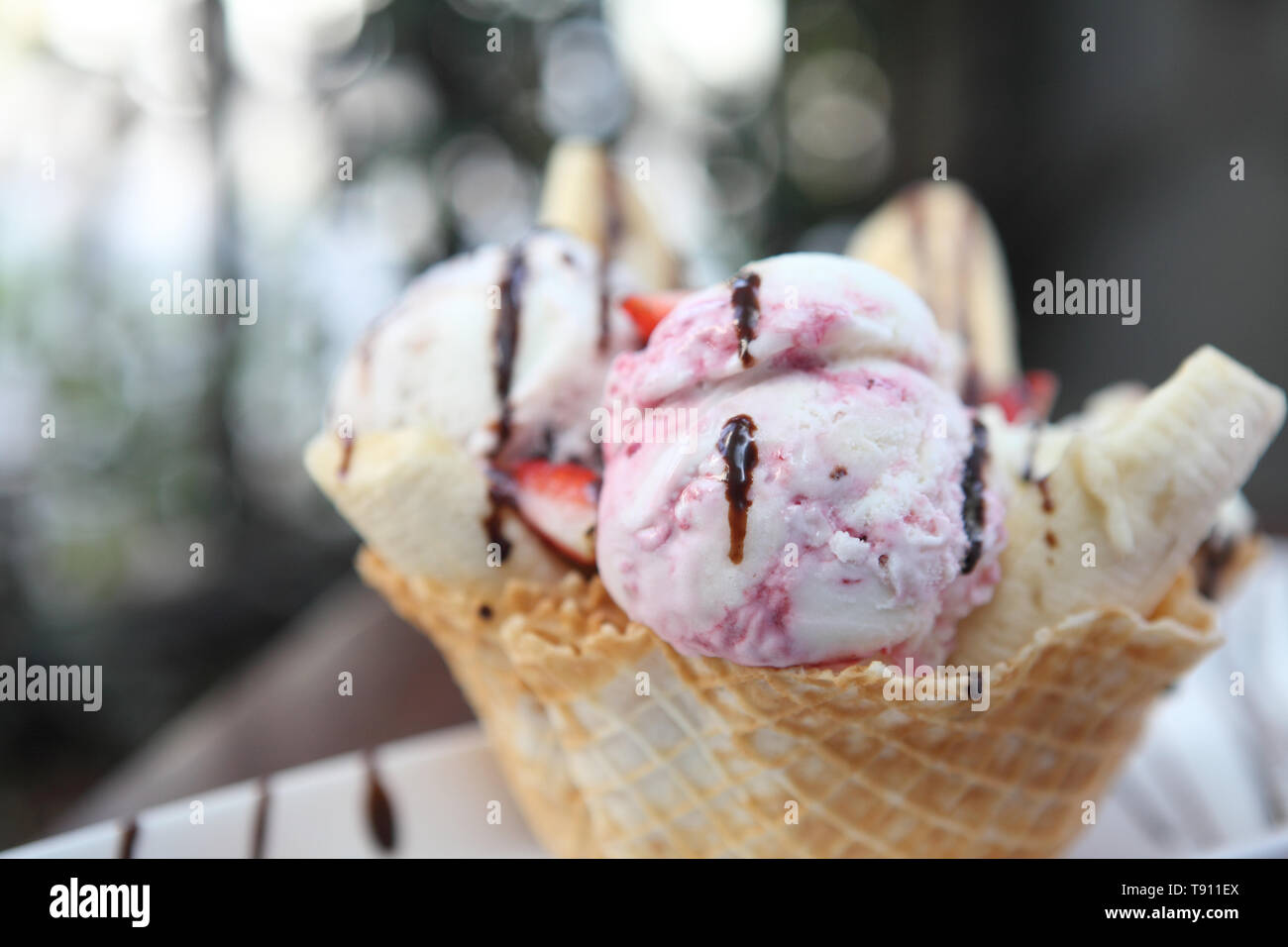 Waffles with ice cream and fruits Stock Photo - Alamy