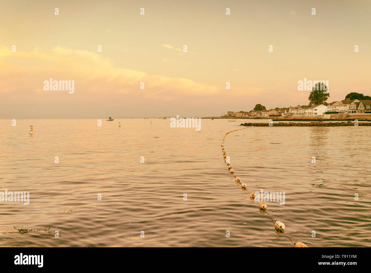 Black Point Beach, Niantic, Connecticut at twilight golden hour sunset, golden sepia VSCO type vintage filter hires photo, see series varied filters Stock Photo