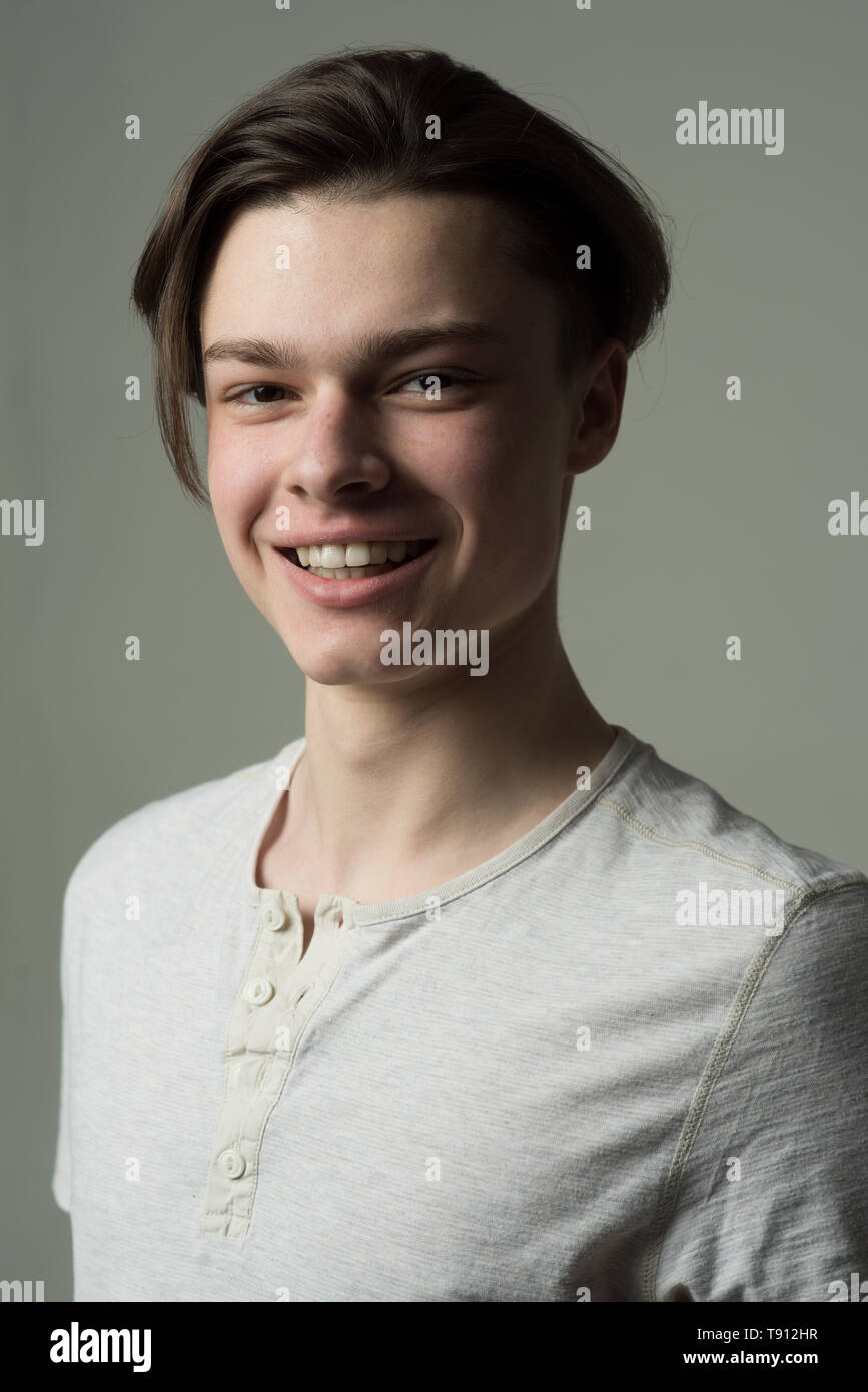 Guy On Smiling Happy Face In Light Shirt Grey Background Macho
