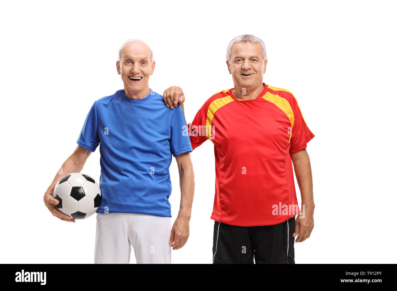 Two elderly soccer players isolated on white background Stock Photo