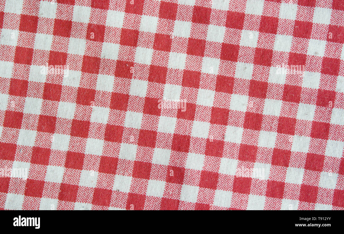 Red linen checkered tablecloth. Red and white texture. Stock Photo