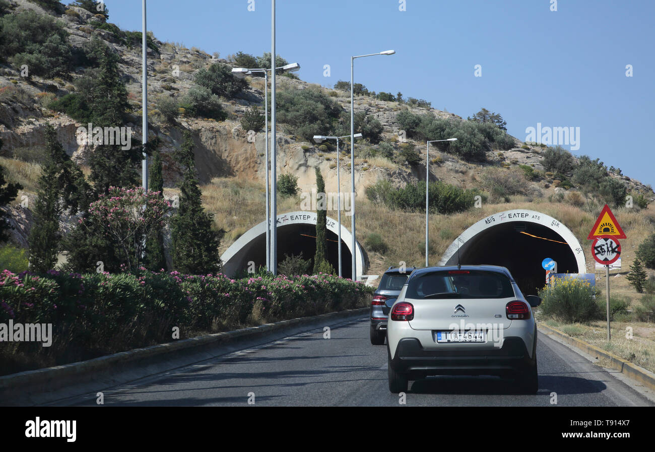 Athens Attica Greece Car Drive through Mountainside Tunnels Stock Photo