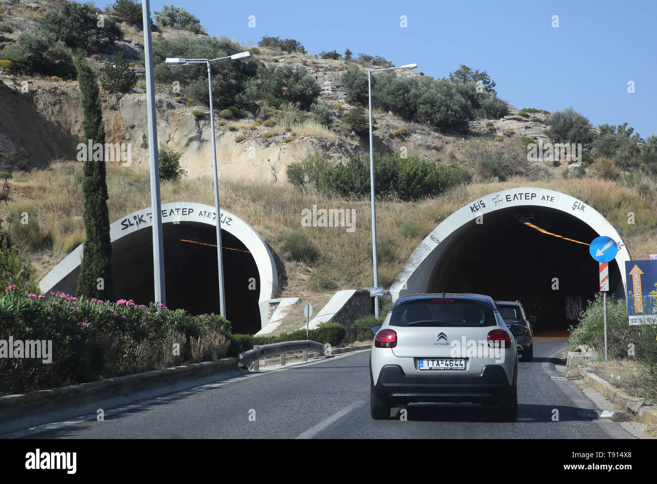 Athens Attica Greece Car Drive through Mountainside Tunnels Stock Photo