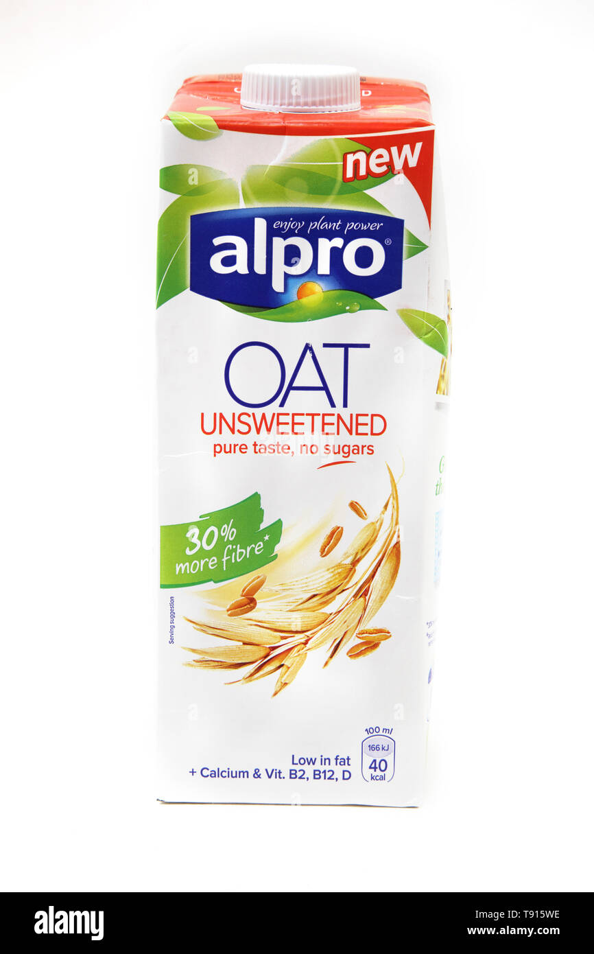 Vegan Alpro Oat Unsweetened Lactose Free Milk Alternative Stock Photo -  Alamy