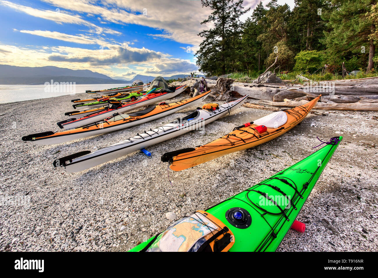 Kayaks on shell beach, Princess Maragret Marine Park, Portland Island, Gulf Islands National Park Reserve, British Columbia, Canada Stock Photo